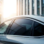 Find window tint near me with a sleek, professionally tinted car highlighting the benefits of window film.