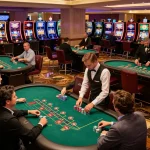 Players engaging in blackjack on the casino floor at Go 88, illustrating strategic bets and vibrant atmosphere