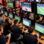 Enthusiastic sports fans engaging in live betting at a dynamic event while using gen-e apps to place wagers